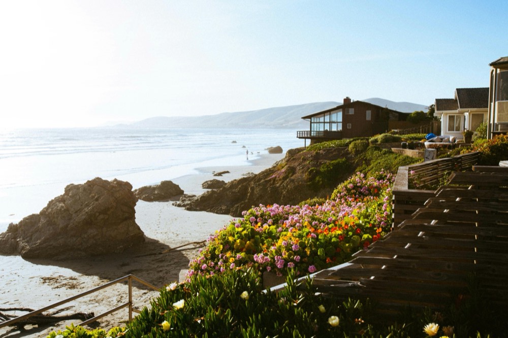 Homes on a bluff above the California Central Coast shoreline